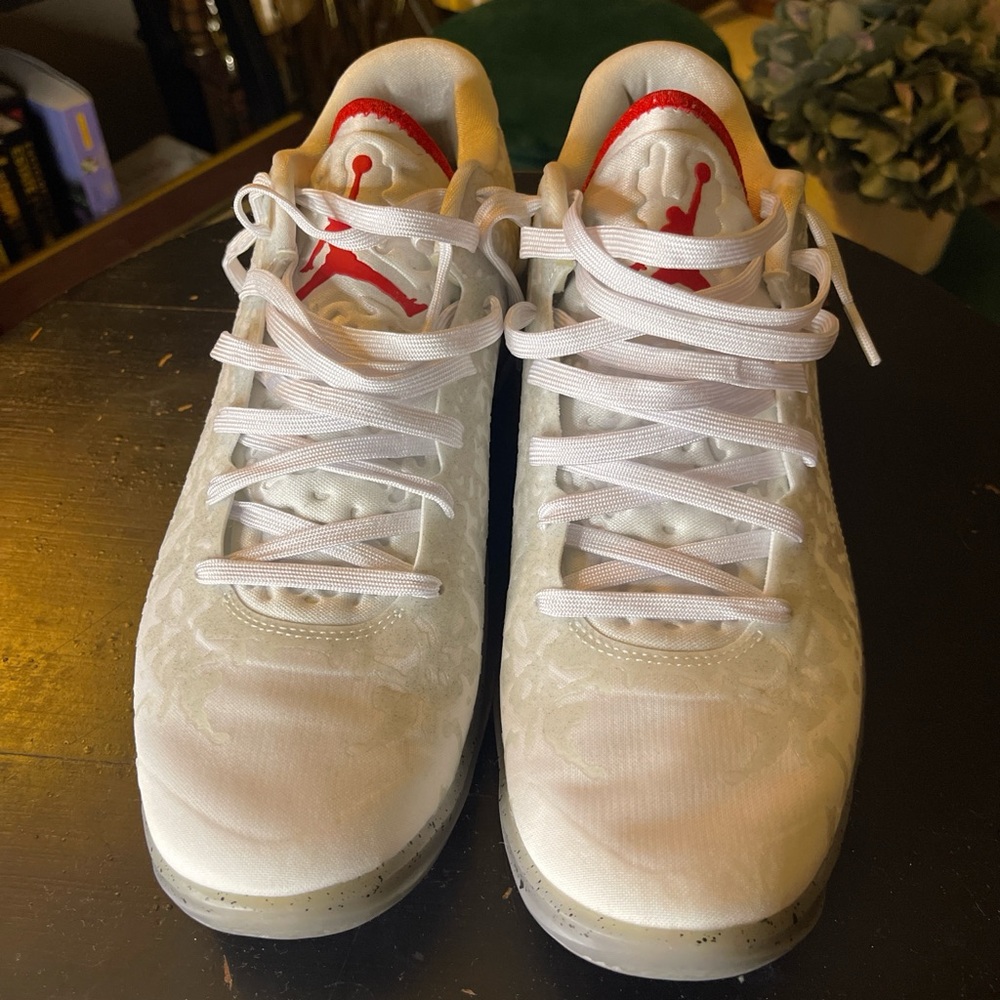 Nike White Jordan Sneakers with Red Jumpman Accent